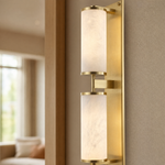 Cylinder Arm Stacked Alabaster Black Wall Sconce by Dalmivik, product or room detail view