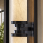 Cylinder Arm Stacked Alabaster Black Wall Sconce by Dalmivik, product or room detail view
