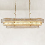 Clear fluted glass linear chandelier with stepped tiers