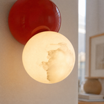 Duo Sphere Crimson Eclipse Alabaster Wall Sconce by Dalmivik, product or room detail view
