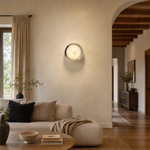 Luna Disc Chrome Bezel Alabaster Wall Sconce by Dalmivik, product or room detail view