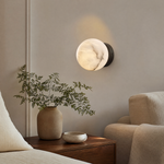 Luna Disc Compact Orb Alabaster Black Wall Sconce by Dalmivik, product or room detail view