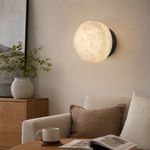 Luna Disc Medium Orb Alabaster Black Wall Sconce by Dalmivik, complete fixture view