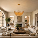 Amber fluted-glass round chandelier in a fireplace living room.
