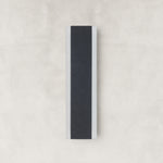 Black slim wall sconce unlit frontal view