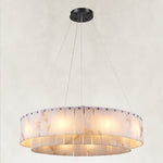 Illuminated black-hardware alabaster ring chandelier with its canopy.