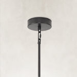 Black pendant canopy and rod connection.