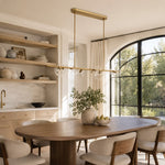 Bubble Glass Linear Island Chandelier in Aged Brass - interior setting