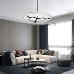 Carve Alabaster Pendant Light – Hand‑Carved Stone Shade with Black Frame by Dalmivik, product or room detail view
