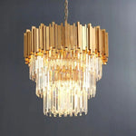 Illuminated crystal cascade beneath a gold-tone metal crown against a dark background.