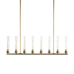 Eight-light brass-tone cylinder chandelier against a white background.
