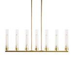 Seven-light brass-tone cylinder chandelier against a white background.