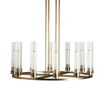 Wide brass-tone cylinder ring chandelier against a white background.