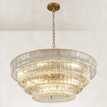 Clear fluted-glass round chandelier viewed from below.