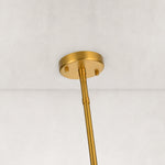 Petal glass chandelier, gold-tone ceiling canopy and rod close view.