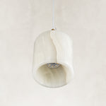 Cloud Onyx Cylinder Pendant viewed from below with its integrated LED source