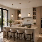 Cloud Onyx Cylinder Pendant illuminated in a contemporary kitchen