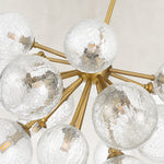 Nineteen-Light Glass Globe Chandelier 24" brass-tone fixture detail