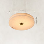 Dimensions of the Cora alabaster ceiling light showing an 11.8-inch diameter and 2-inch height