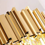 Close-up of gold-tone fins around the circular frame.