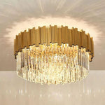 Crystal flush mount casting a pattern of light on the ceiling.