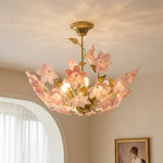 Dalmivik Rosalia gold and pink glass flower chandelier installed in a room