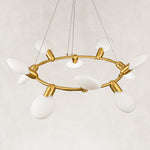Gold-tone ring chandelier detail.