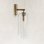 Double-Layer Clear Glass Wall Sconce in Aged Brass, complete fixture light off