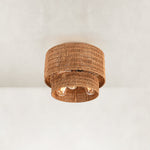 Natural-tone fixture illuminated underside and two-tier weave.