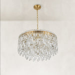 Unlit three-quarter view of the faceted crystal drum chandelier
