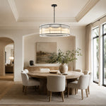Fluted Glass Rod Drum Chandelier in Matte Black - interior setting
