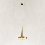 Gilded Marble Disc Pendant shown against a neutral background