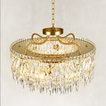 Gold-tone tiered crystal chandelier, upper ring and curved supports close view