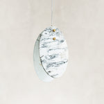 Product detail of Graphic Vein Marble Disc Pendant against a neutral background