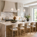 Graphic Vein Marble Disc Pendant installed above a kitchen island
