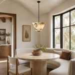 Graphic Vein Marble Pendant installed above a dining table