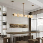 Handcrafted Alabaster Pebble Linear Chandelier – Gold & White LED by Dalmivik, complete fixture view