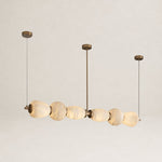 Handcrafted Alabaster Pebble Linear Chandelier – Gold & White LED by Dalmivik, complete fixture view