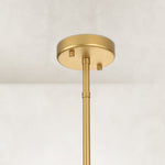 Glass drum chandelier, round canopy and rod at the ceiling.