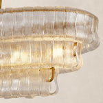 Illuminated clear glass panels on the linear chandelier.