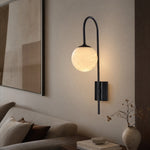 Bullet Shade Arched Stem Alabaster Globe Wall Sconce by Dalmivik, product or room detail view