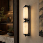 Cylinder Arm Stacked Alabaster Black Wall Sconce by Dalmivik, product or room detail view