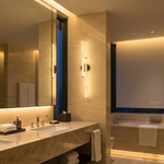 Linear Rod Crossed Alabaster Tubes Wall Sconce by Dalmivik, product or room detail view