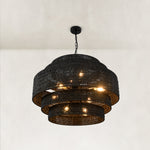 Black woven drum chandelier fixture detail.