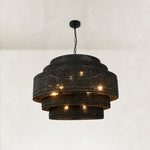 Black woven drum chandelier fixture detail.