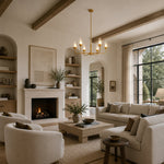 Gold-tone glass chandelier, six-light beam-ceiling living room.