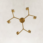 Gold-tone glass chandelier, six-light plan underside.