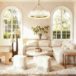 Petal Round LED Chandelier, 32 in in brass finish, shown in a living room