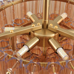Stepped tube-glass chandelier, amber glass and brass-tone internal frame.