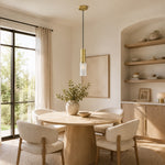Brass ribbed glass mini pendant in a dining area